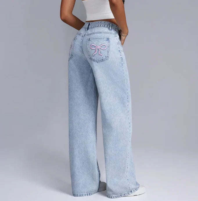 Denim Jeans met Wijde Pijpen en Roze Strikdetails